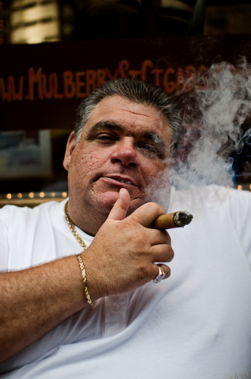 Fat Guy Smoking a Cigar
